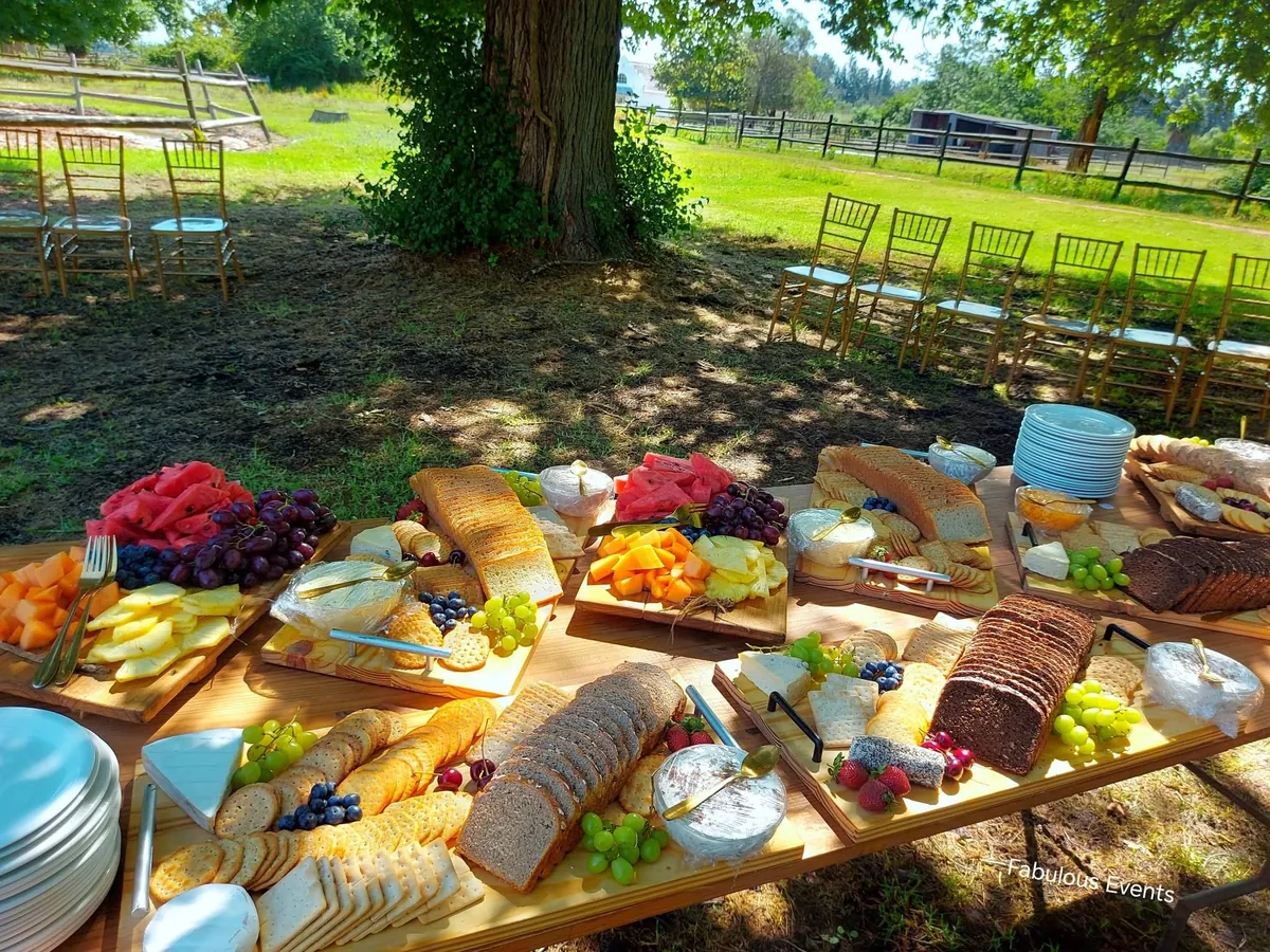 Outdoor picnic-style celebration setup by Fabulous Events