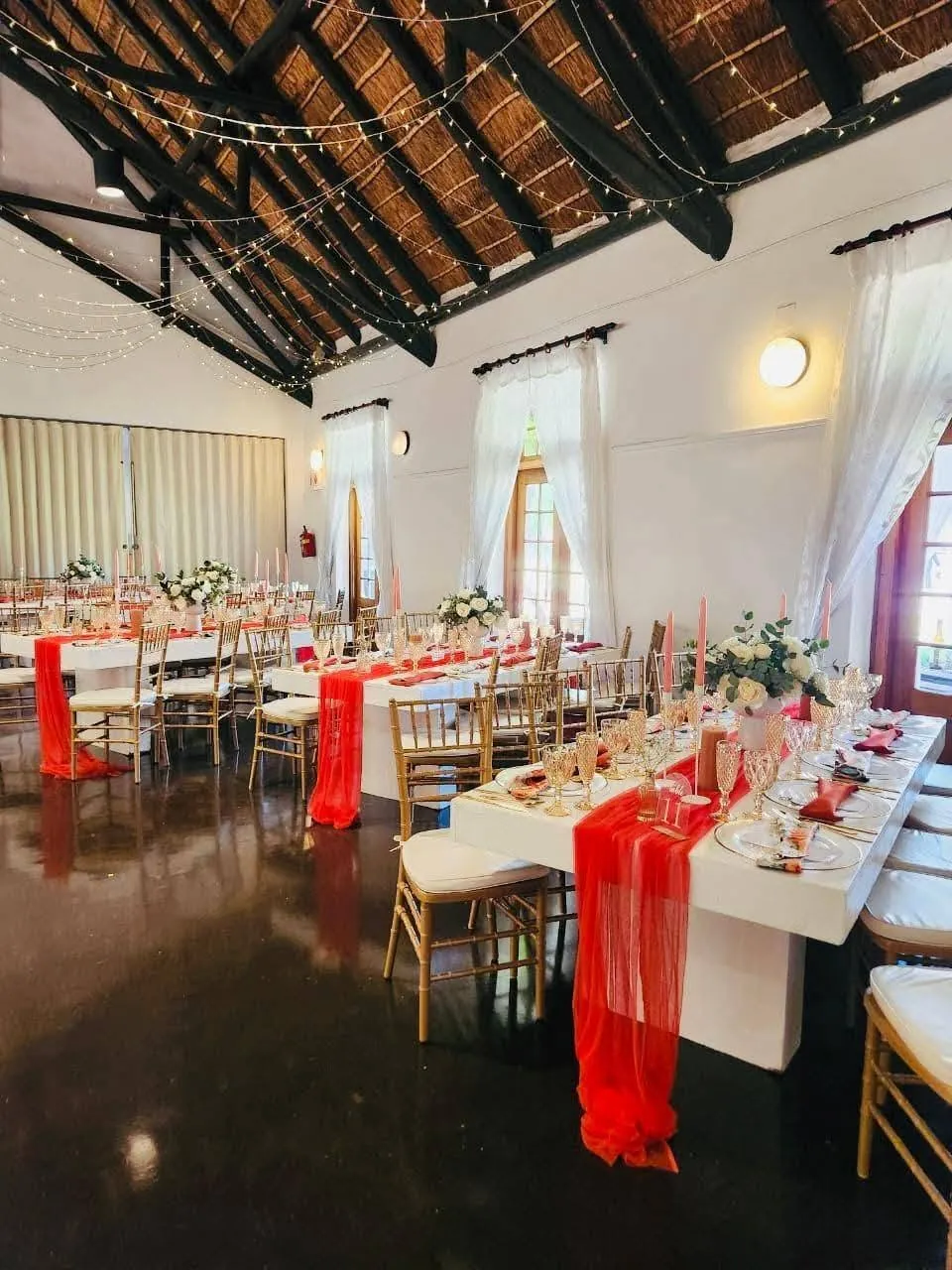 Red and white wedding reception styling by Fabulous Events
