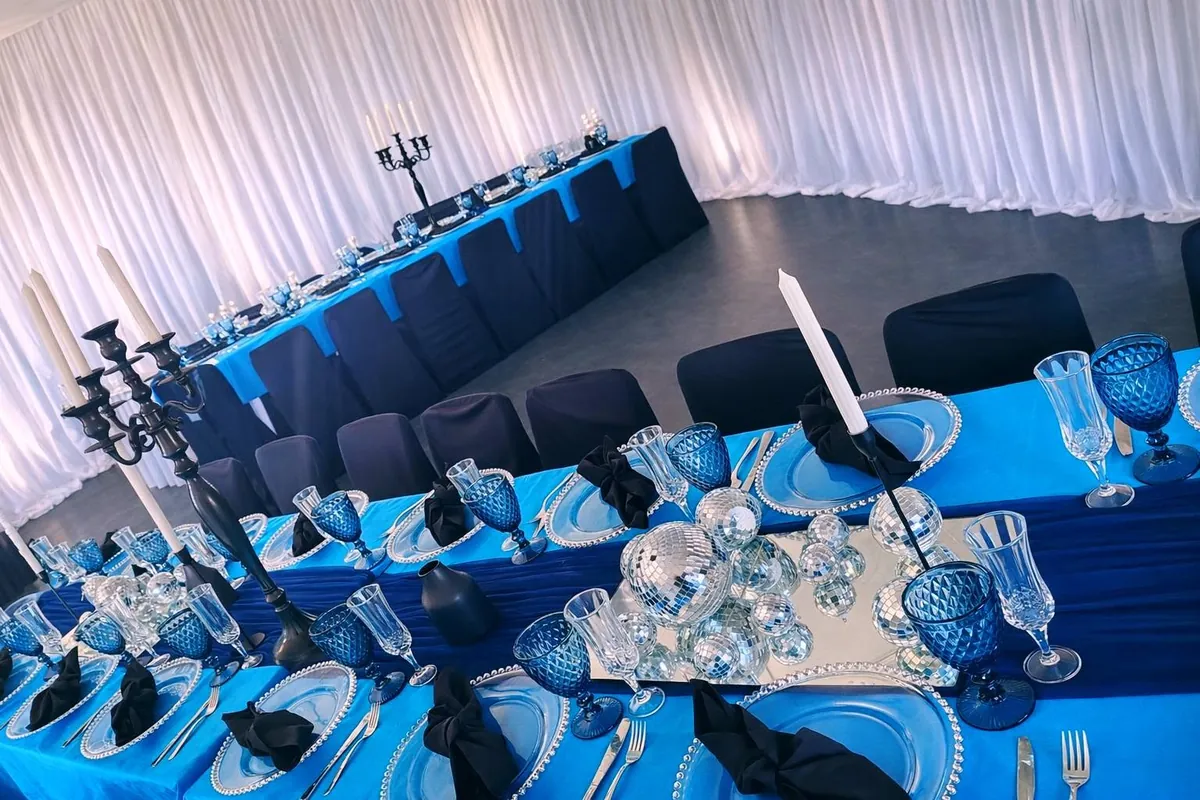 Blue-themed wedding tablescape by Fabulous Events